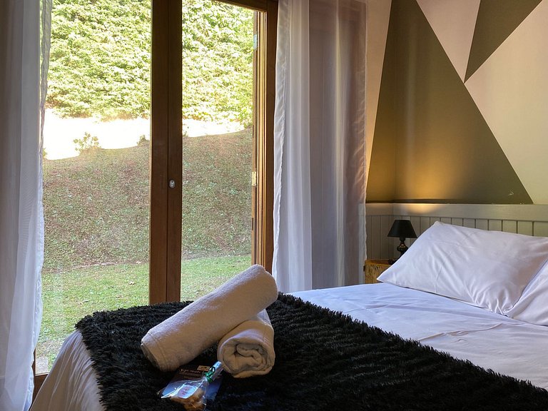 Suíte tripla e banheira de hidromassagem